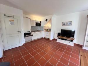 Feriendorf Rugana - Komfortplus Ferienwohnung mit 1 Schlafzimmern und Terrasse A29