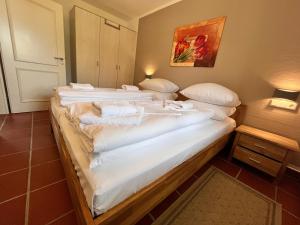 Feriendorf Rugana - Komfortplus Ferienwohnung mit 1 Schlafzimmern und Terrasse A29