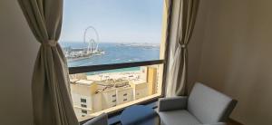 Deluxe Spacious 2BR on JBR Beach, Full Dubai Eye and Panoramic Sea Views - By Sunkised Holiday Homes