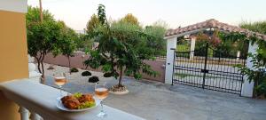 Tria Liodendra Corfu-Sun