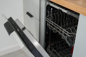 Racławicka 7 Deluxe Studios by BookingHost