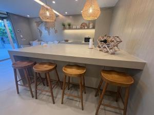 Precioso apartamento de playa con jardín privado