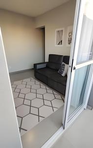 2 quartos com ar e garagem