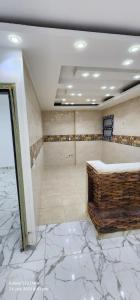 Prime Location Apartment with Unobstructed Giza Pyramids View & Easy City Access