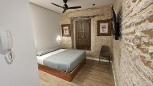 Arena Centro Rooms&Suites, by Homing U