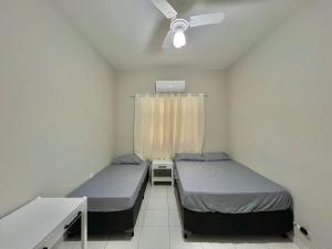 Apto Guarujá beira-mar com Wi-Fi e ar-condicionado