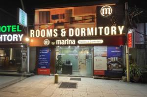 The Marina Kozhikode AC Rooms and Dorms Opposite to Beach