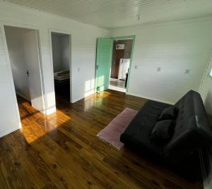 Linda casa bem localizada em Passo de Torres