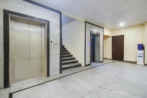 Hotel O Anuguna Tulasi Grand Near JNTU University Hyderabad