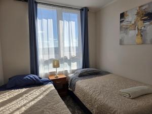 Moderno dpto con linda vista a laguna