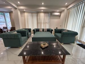 Divine Stay-3BHK, AC, WiFi, Kitchen