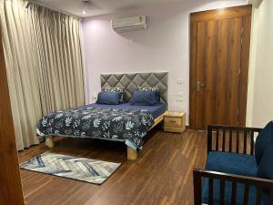 Divine Stay-3BHK, AC, WiFi, Kitchen