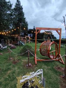 Magic Cabin in Jardín de Dota A real Costa Rican Farm experience with Breakfast included Trout fishing in the lagoon Fruit tasting & beautiful garden with farm animals