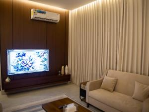 شقة بغرفة نوم ماستر وغرفة معيشة دخول ذاتي قريبة من المطار والوجهات الترفيهية Master Bedroom Apartment with Living Room Self Check in Near Airport and Popular Attractions