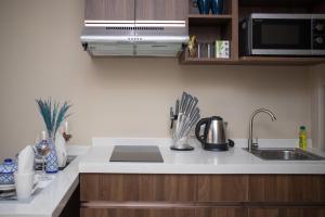 Chic 1BR Condo Steps from Nai Harn S311