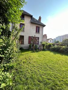 Maison avec jardin, à deux pas du centre-ville