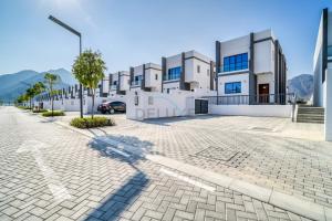 Luxurious 4-Bedroom Villa with Assistant Room and Private Pool in Al Dana Island, Fujairah by Deluxe Holiday Homes