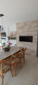 Espaço com piscina 400m da praia