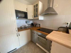 Appartement au face port avec grande terrasse