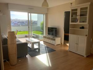 Appartement au face port avec grande terrasse