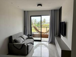 Apê aconchegante a poucos passos da praia