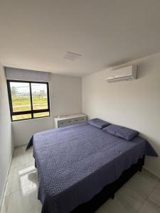 Apê aconchegante a poucos passos da praia