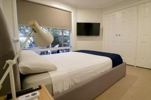 3 Bed Townhouse with Games Room, 5 min walk to the beach