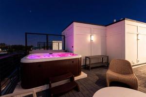 Luxe 4BR Retreat with Hot Tub & Skyline Deck