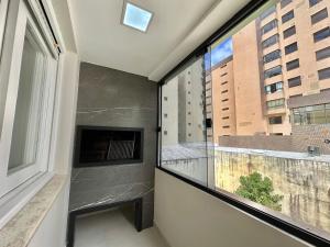 Ap 1 quadra mar, praça Luiz Bassani