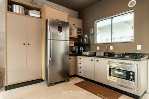 Duplex pé na areia com vista deslumbrante RAT001