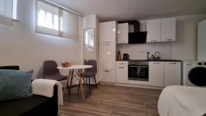 Cozy Curved-Wall Studio