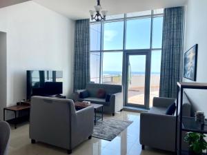 Seaside Serenity with Gym & Pool