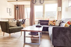 Urlaubsbrise 52 Ameland - schön eingerichtete Wohnung für bis zu 5 Personen - Balkon nach Süden ausgerichtet mit schönem Blick in den Innengarten