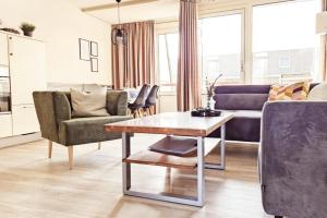 Urlaubsbrise 52 Ameland - schön eingerichtete Wohnung für bis zu 5 Personen - Balkon nach Süden ausgerichtet mit schönem Blick in den Innengarten