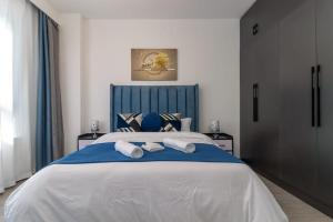 modern serenity suites apartments with swimming pool,modern equipped gym,private parking space, children playing ground, proximity to major shopping malls and unbeatable city views