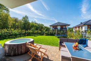 Apartament Słoneczna Sosnówka z sezonowym jacuzzi