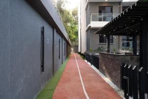 supreme living apartments with well equipped gym swimming pool ample parking area, children playing ground and amazing scenic views