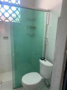 Quarto em casa arborizada