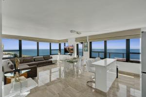 Stylish Oceanfront 2BR 1 and a half BA Condo with Resort Amenities Pools Gym Sauna 1402