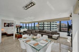 Stylish Oceanfront 2BR 1 and a half BA Condo with Resort Amenities Pools Gym Sauna 1402