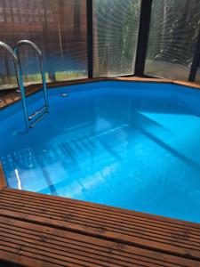 Chalet piscine chauffée et couverte