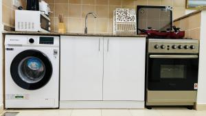 X11 Furnished with balcony England cluster international city near Dragon Mart