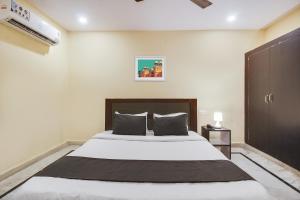 Hotel O Anuguna Tulasi Grand Near JNTU University Hyderabad