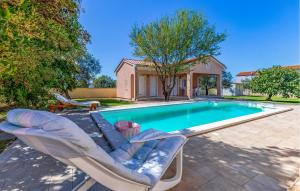 Nice Home In Peroj With Private Swimming Pool, Can Be Inside Or Outside