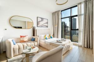 Bright Studio in JVC with Gym & Pool Access