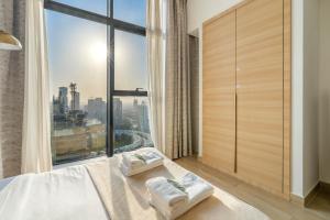 Bright Studio in JVC with Gym & Pool Access