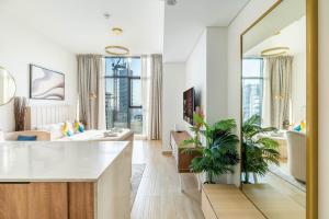 Bright Studio in JVC with Gym & Pool Access