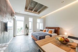 One-Bedroom Apartment with Terrace room in Max Luxury Apartments