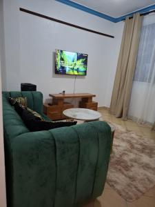 Alif Homes - Cozy 1 Bedroom Apartment behind Naivas Mwembe Tayari & Mombasa Mall