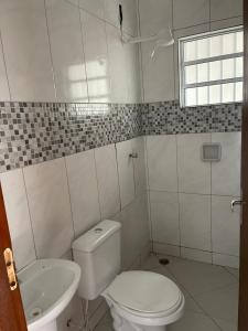 Casa com piscina lado praia